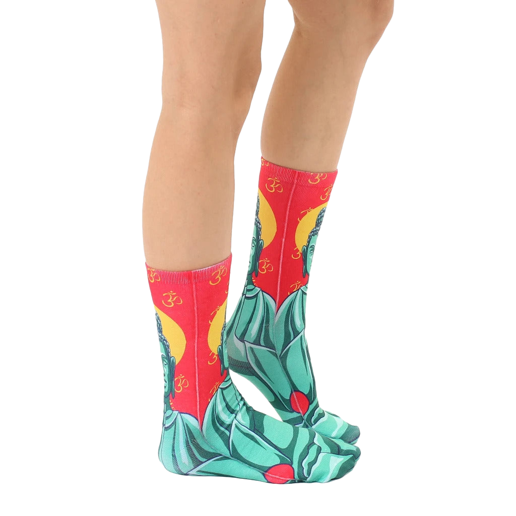 Side view of Buddha socks on a person's legs, showcasing the sock's design and fit. [lf]