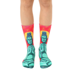 Pair of crew socks featuring a teal Buddha image on a red background with Om symbols. [lf]