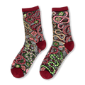 Sheer black crew socks featuring winding pink and green snakes, small flowers, and solid burgundy cuffs and toes.