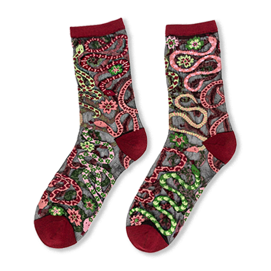 Sheer black crew socks featuring winding pink and green snakes, small flowers, and solid burgundy cuffs and toes.