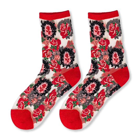 Sheer socks with solid red toe, heel, and cuff, featuring a pattern of red roses and vintage black-framed cameo portraits.