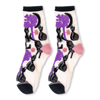 Pair of sheer crew socks featuring a pattern of black cats, twisted purple trees, moons, and stars with solid black cuffs.