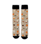 Flat lay of two Pumpkin Spice Latte socks against a neutral background.