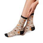 Lifestyle shot of a model wearing Pumpkin Spice Latte socks, showing how they look on.