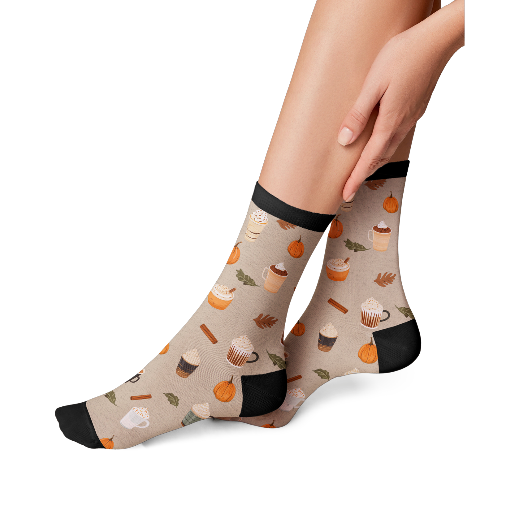 Lifestyle shot of a model wearing Pumpkin Spice Latte socks, showing how they look on.