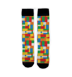 A pair of black socks with a colorful pattern of Lego bricks.