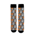 Close-up view of 'It's Leg Day' socks showing the detailed design and fabric texture.