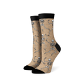 Pair of crew socks; beige and black options; dancing skeleton pattern.