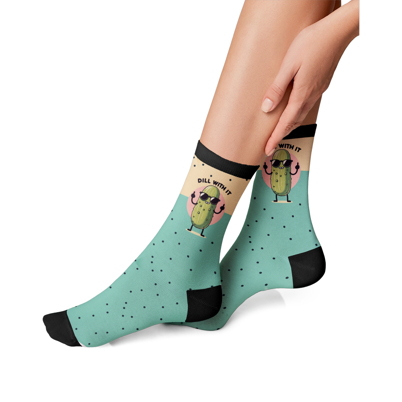 Lifestyle photo showing the 'Just Dill With It' socks on a person's feet. The socks are teal with a pickle design.