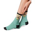 Lifestyle photo showing the 'Just Dill With It' socks on a person's feet. The socks are teal with a pickle design.
