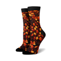 Lifestyle shot of 'Autumn Leaves' socks on a model's feet, showing the socks in a casual setting.