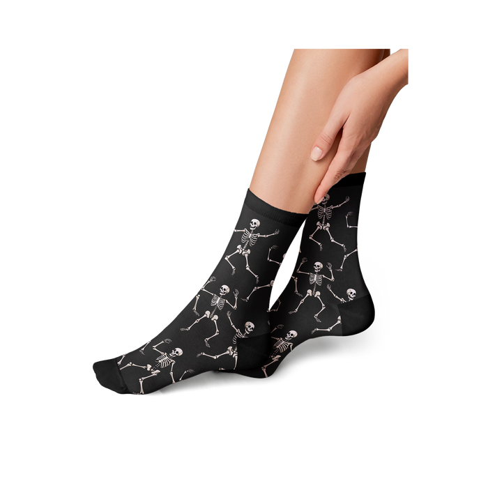 Close-up shot: Detail of the beige 'Dead Man's Party' sock pattern.