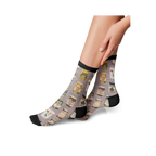 Lifestyle shot of a person wearing Pickle Jar socks, showing how they look when worn.