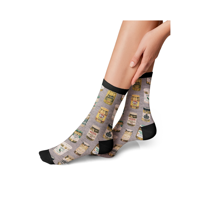 Lifestyle shot of a person wearing Pickle Jar socks, showing how they look when worn.