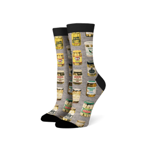 Pair of crew socks with a gray background and a repeating pattern of illustrated vintage pickle jars in various colors. 