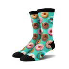 Crew socks with a teal background and colorful donut print.  Donuts in pink, blue, chocolate, and yellow are depicted.