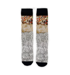 Flatlay image of a pair of burrito socks on a black background.