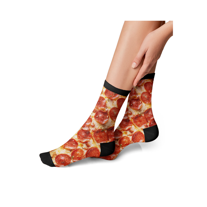 Flat lay product shot showing both pepperoni pizza socks together.