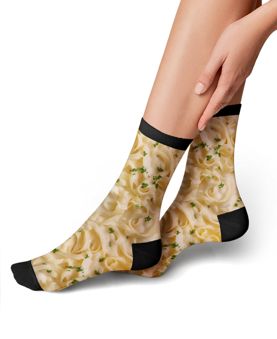 A pair of socks with a pattern of fettuccine alfredo.
