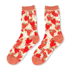 Sheer socks with a red strawberry and white daisy pattern, featuring coral-pink toes, heels, and ruffled cuffs.