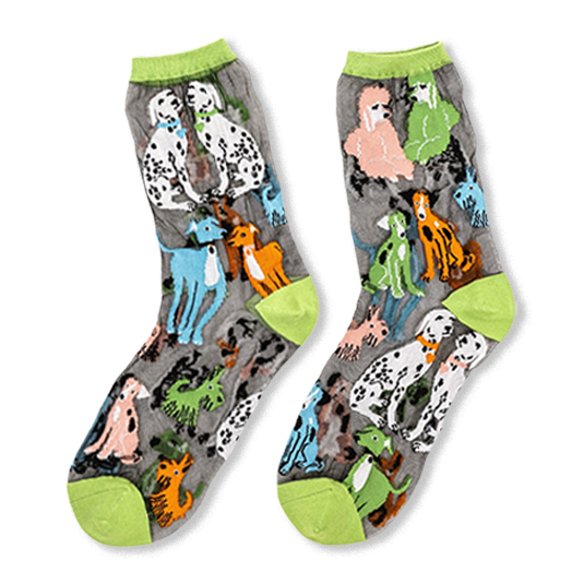 Pair of sheer socks with bright lime green cuffs and toes. The dark transparent fabric features dalmatians and colorful dogs.