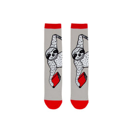 gray crew socks w/red cuff. sloth pattern printed in black and white, holding red books.   