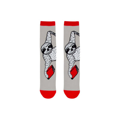 gray crew socks w/red cuff. sloth pattern printed in black and white, holding red books.   