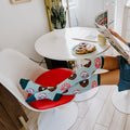 A friend laughs holding up a donut, her Go Nuts For Donuts socks in Blue Heather kicked out across the cafe floor. [lf]