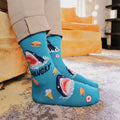 [lf] Person in tan pants wears blue "Hangry" shark socks with fast food patterns.