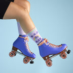 [lf] Legs in purple roller skates and rainbow "BAD ASS" socks against a blue background.