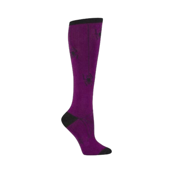 Knee-high socks in purple with a black spider web and spider design.  The socks have a black toe and heel.