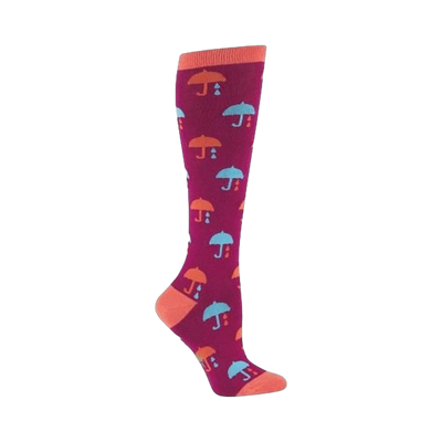 Knee-high socks in deep pink with a repeating pattern of coral and teal umbrellas and raindrops.