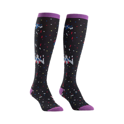 Pair of black knee-high socks with purple cuffs. Features a retro pixel art bowling design and colorful confetti.