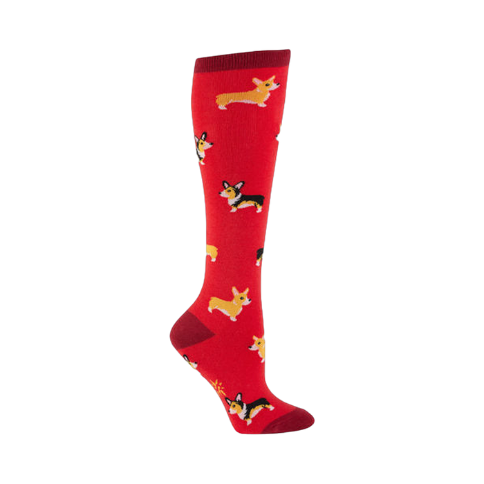 Red knee-high socks with a repeating pattern of illustrated Corgis in yellow, black, and white.  }}