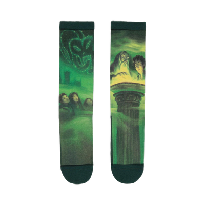 Pair of crew socks in green and yellow, depicting scenes from Harry Potter and the Half-Blood Prince book cover, including Dumbledore, Harry, and the Prince's memory.