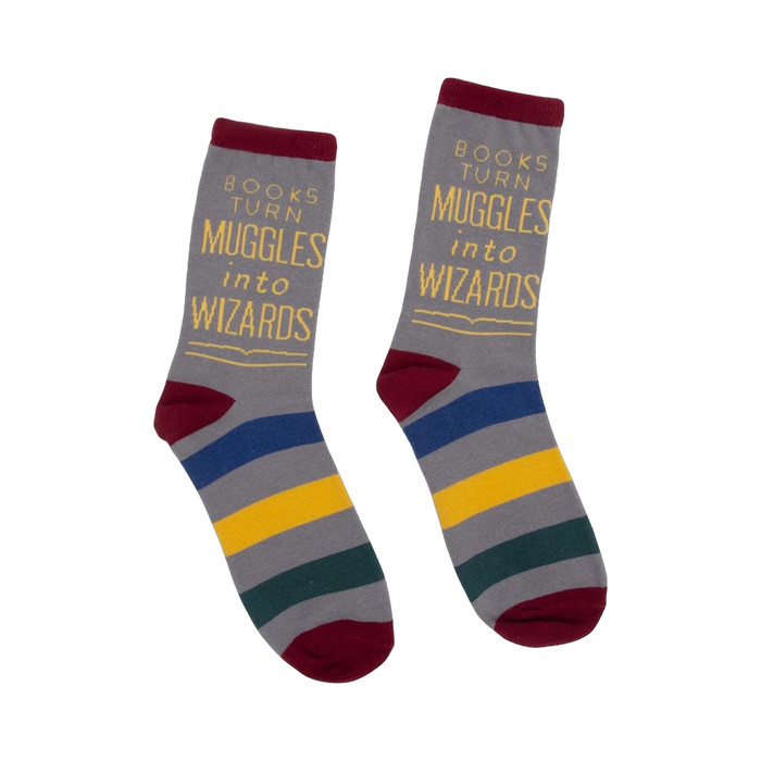 A pair of gray crew socks with maroon, blue, gold, and green stripes. The socks feature the quote: 