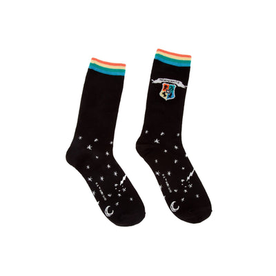 black harry potter hogwarts crest socks with rainbow stripes, white moons and stars, and hogwarts crest.  