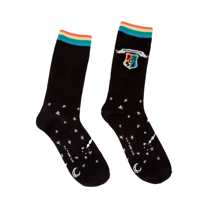 Black crew socks with a multicolored Hogwarts crest and white stars. Features a rainbow colored cuff. }}