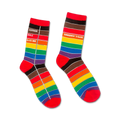Pair of crew socks featuring rainbow stripes and a library card-inspired design.  Colors include red, orange, yellow, green, blue, indigo, and violet.