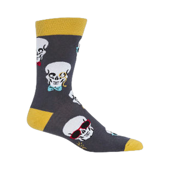 Gray crew socks with a repeating pattern of skulls wearing sunglasses and bow ties. Yellow cuff detail.