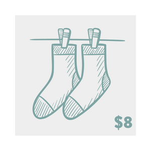 Product shot of two crew socks hanging on a clothesline.  They're a muted teal/purple, with a hand-drawn sketch design.