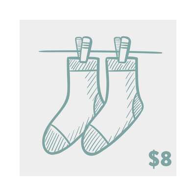 Product shot of two crew socks hanging on a clothesline.  They're a muted teal/purple, with a hand-drawn sketch design.