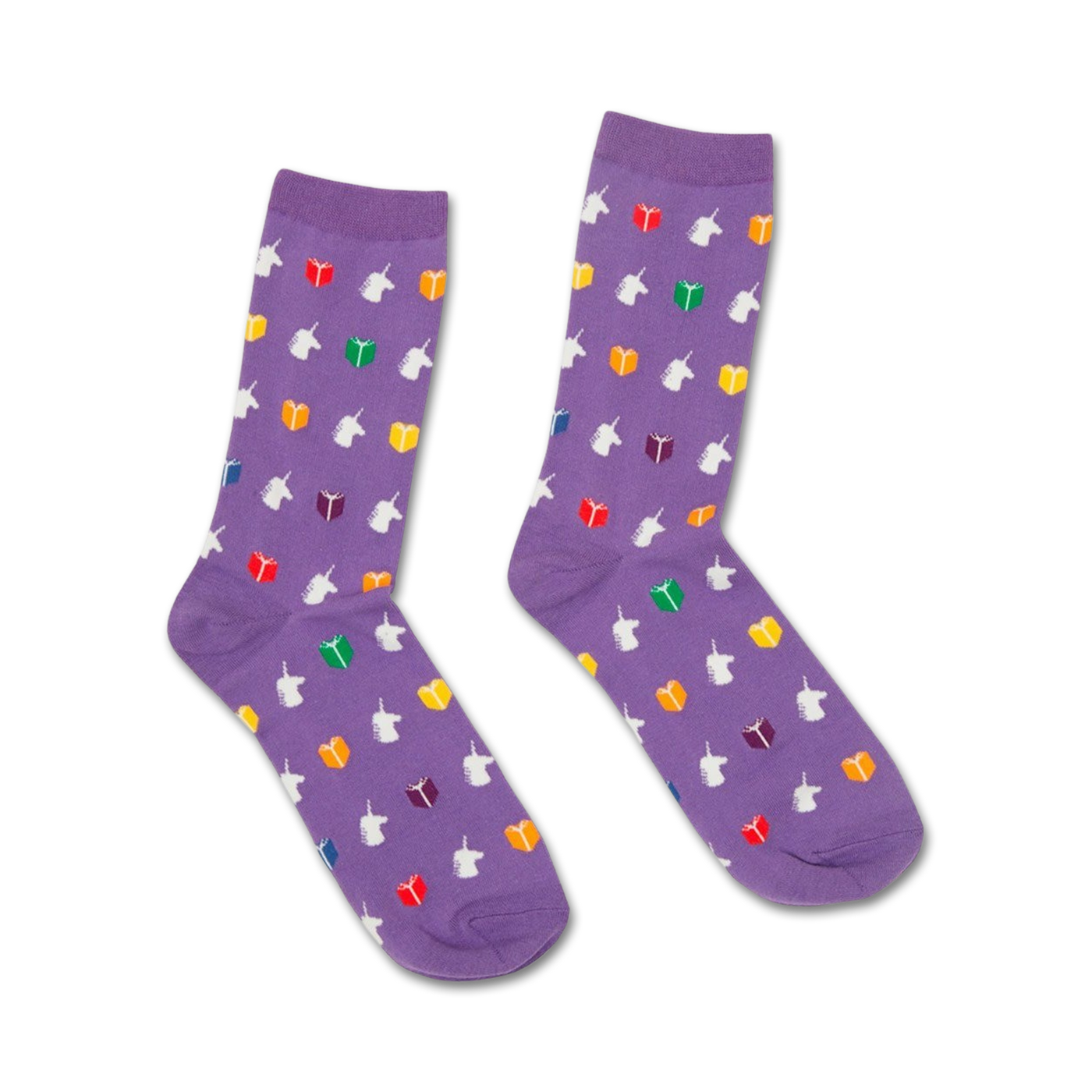 Pair of purple crew socks featuring a whimsical pattern of white unicorns reading rainbow-colored books.