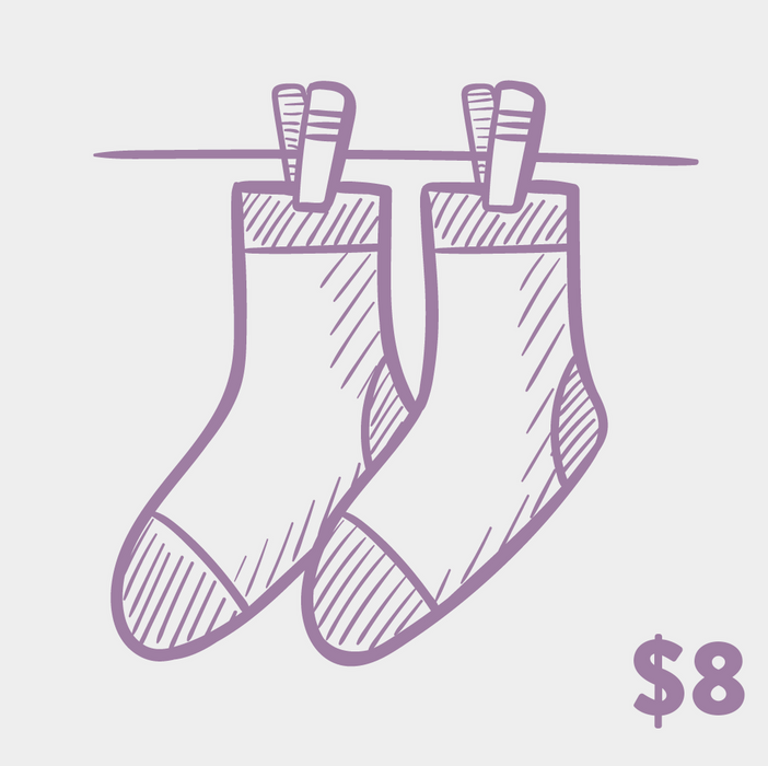 Close-up showing the subtle color variation and hand-drawn style of the Mystery Socks.