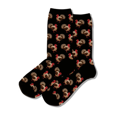 Pair of black crew socks with a repeating pattern of brown and red turkeys.