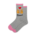 Lifestyle shot showing a pair of gray Meowied socks with pink cuffs.