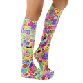 Lifestyle shot showing the socks on a person's legs.  The socks are knee-high and feature a colorful, psychedelic design. [lf]