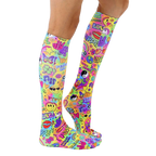 Lifestyle shot showing the socks on a person's legs.  The socks are knee-high and feature a colorful, psychedelic design. [lf]