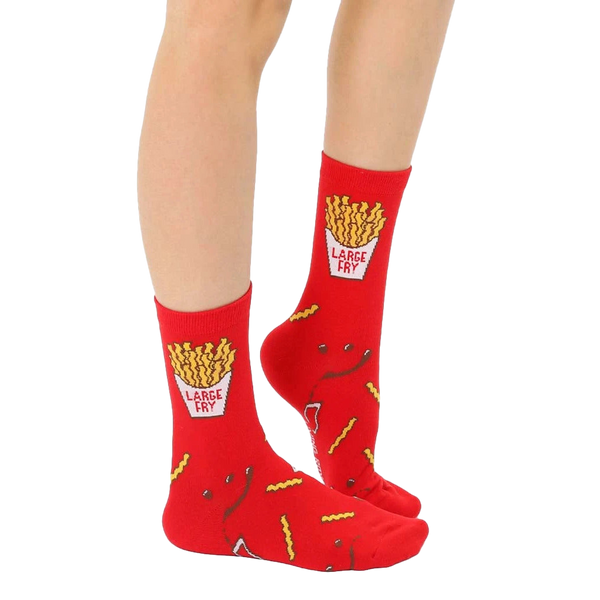 Lifestyle shot of adult and child wearing matching French fry socks. [lf]
