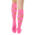 Rear view of pink knee-high compression socks displaying yellow butterflies and a small logo near the heel. [lf]